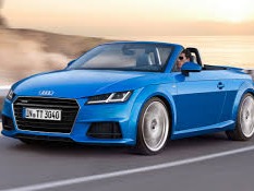 The Audi TT is a 2-door compact sports car marketed by Volkswagen Group subsidiary Audi since 1998. It is assembled by the Audi subsidiary Audi Hungaria Motor Kft. in GyÅ‘r, Hungary, using bodyshells manufactured and painted at Audi's Ingolstadt plant for the first two generations[2] and parts made entirely by the Hungarian factory for the third generation.[3]For each of its three generations, the TT has been available as a 2+2 coupé and as a two-seater roadsteremploying consecutive generations of the Volkswagen Group A platform, starting with the A4 (PQ34). As a result of this platform-sharing, the Audi TT has identical powertrain and suspension layouts as its related platform-mates; including a front-mounted transversely oriented engine, front-wheel drive or quattro four-wheel drive system, and fully independent front suspension using MacPherson struts.https://en.wikipedia.org/wiki/Audi_TT